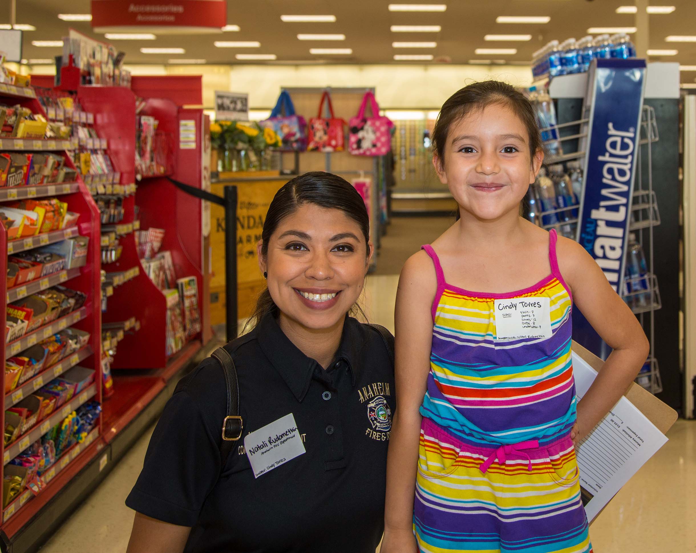 Officer with youth shopper-yqjtpg Officer with youth shopper-yqjtpg
