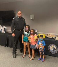 back to school-officer Kids Creating Change (KCC)